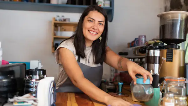 Barista cleaning counter