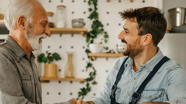 Handyman shakes hands with a customer